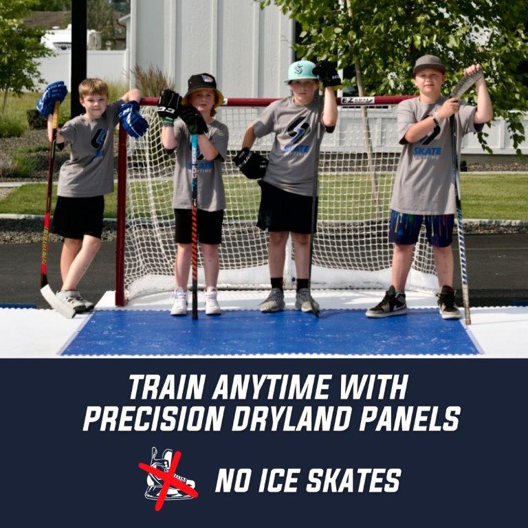 Kids standing in front of a hockey goal