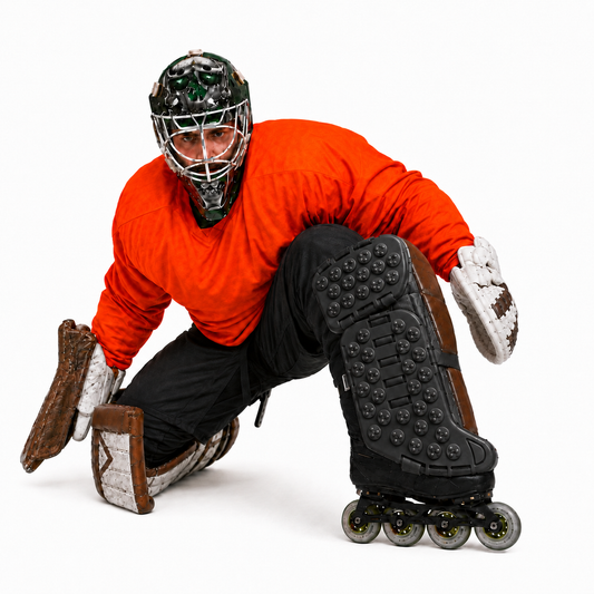 Person in hockey gear with roller skates on a white background